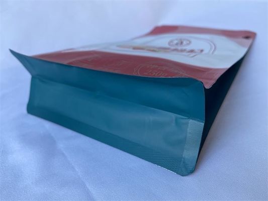 スナック食品の包装の袋は片側のジッパーと金属化された紫外線の表面を注ぎます